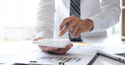 Businessman accountant working analyzing and calculating expense