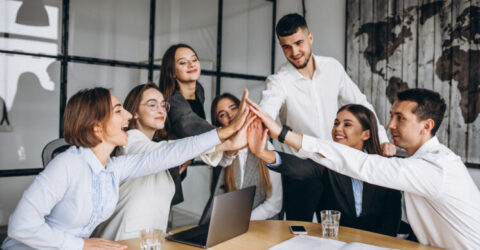 Group of people working out business plan in an office