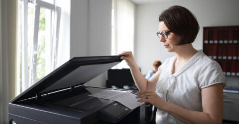 woman-working-office-using-printer